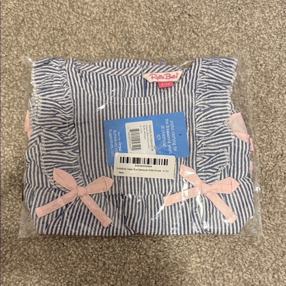 Ruffle Butts Blue and White Striped Romper Pink Details